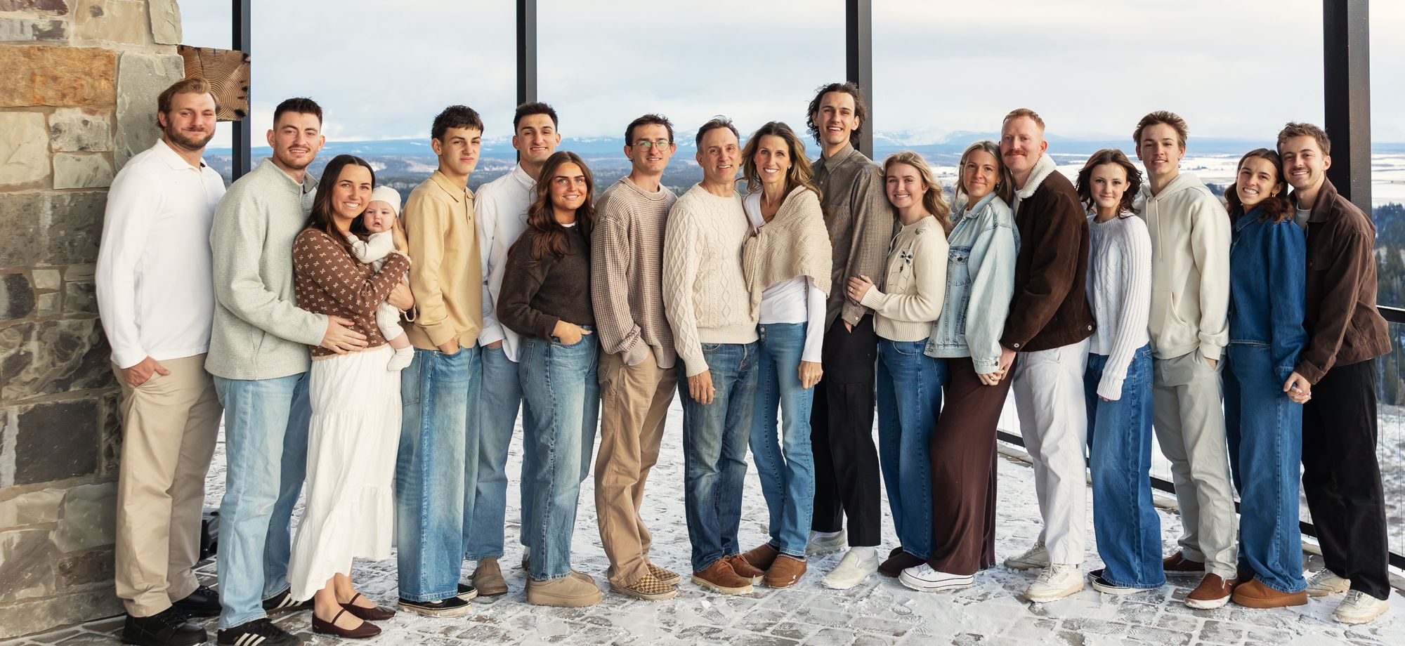 Jenny Free and her family together on a snowy mountain overlook